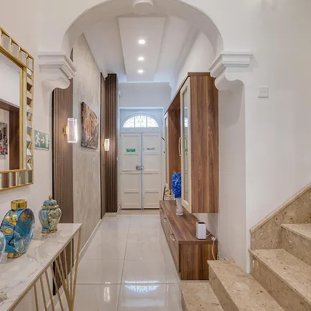 House With Roof Terrace And Maltese Balcony